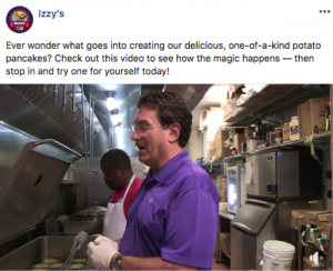 Facebook post with behind-the-scenes restaurant kitchen image with staff making potato pancakes