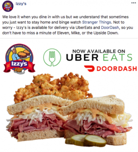 Social media post featuring UberEats and DoorDash delivery of restaurant sandwich, pickles and potato pancakes 