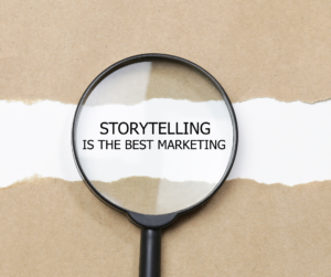 A magnifying glass centered on "storytelling is the best marketing" text 