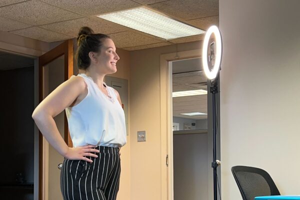 Woman Filming Video With Ring Light