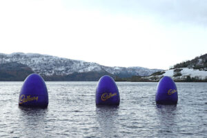 Large Purple Cadbury Eggs Floating In Loch Ness