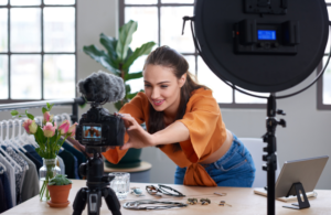 Woman Setting Up Camera To Film