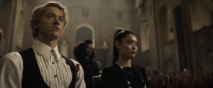 Tom Blyth as Coriolanus Snow and Ashley Liao as Clemensia Dovecote in the trailer for The Hunger Games: The Ballad of Songbirds and Snakes